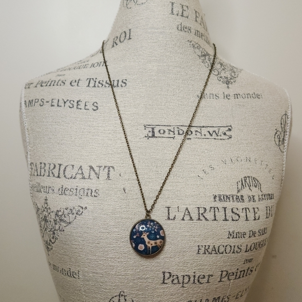 Reversible deer pendant necklace